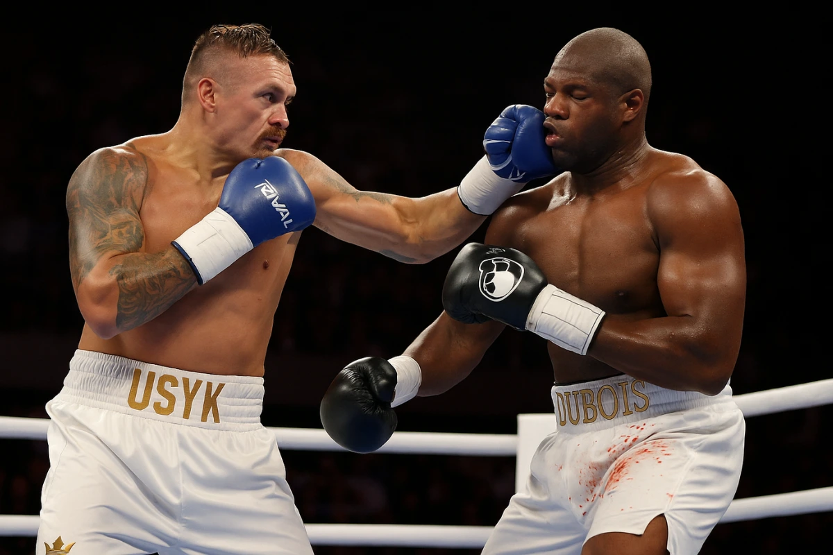 Oleksandr Usyk punches Daniel Dubois in the face during their 2025 heavyweight boxing title fight